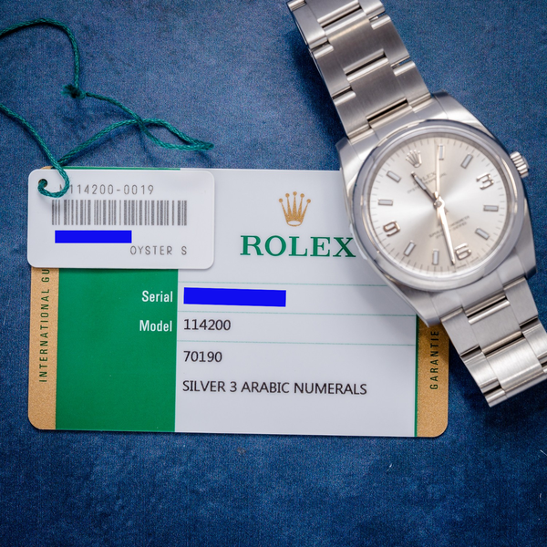 Rolex Oyster Perpetual 34MM (114200) - Steel - Silver Arabic Numerals Dial - 2018 Card+WT & Box